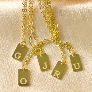 Stainless steel gold square tag necklace with letter pendants, chic and versatile fashion jewelry.