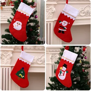 Festive large Christmas stockings featuring Santa, Snowman, and Tree felt appliqué designs