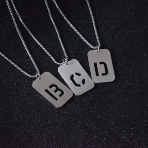 Titanium steel silver square letter pendant necklace, detailed view of alphabet charms.