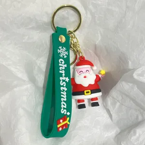 Detailaufnahme des Weihnachtsmann-Schlüsselanhängers mit grüner Silikonschlaufe dekor
