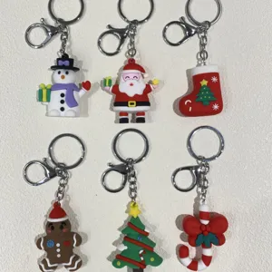 6er-Set bunte Weihnachts-PVC-Schlüsselanhänger mit Weihnachtsmann, Schneemann und Motiven.
