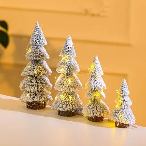 Set of 4 mini flocked snow cedar Christmas trees with warm LED lights for tabletop decor