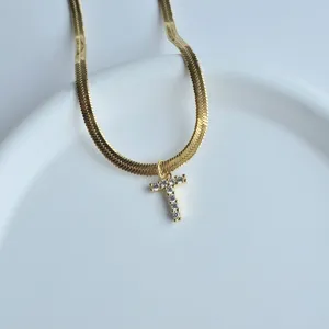 Gold herringbone chain necklace with sparkling zircon letter T pendant, elegant clavicle chain.
