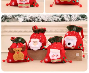 Set aus festlichen Weihnachts-Geschenktüten mit Kordelzug, Nikolaus-, Rentier- und Schneemann