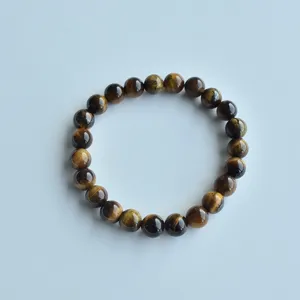 Natural tiger eye stone beaded stretch bracelet, exquisite handmade jewelry accessory.