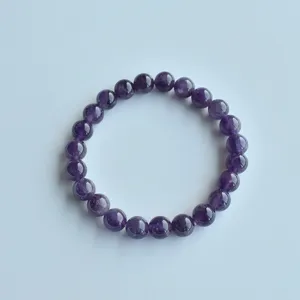 Natural amethyst gemstone bead stretch bracelet, elegant purple crystal jewelry for daily wear.