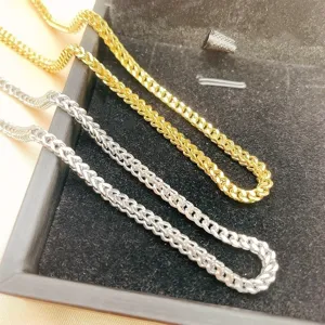 Stainless steel gold and silver curb chain detail view, men's hip hop jewelry accessory