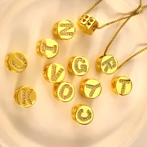 Gold letter bead pendant detail, pave crystal alphabet charm for DIY handmade jewelry crafting.