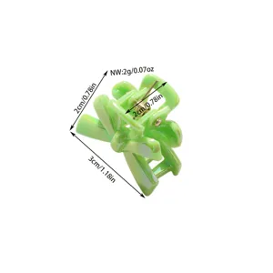 Small dopamine green bow hair claw clip with detailed size measurements.