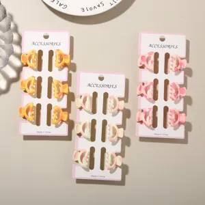 Detail view of colorful 2.5cm mini claw clips in a six-piece set for hair styling