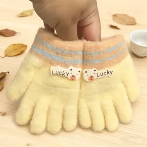 Cute kids winter knitted gloves with cute bear patches and warm striped cuffs detail.