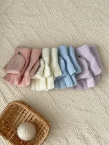 Cute kids winter knit convertible half-finger gloves set in multiple soft pastel colors.