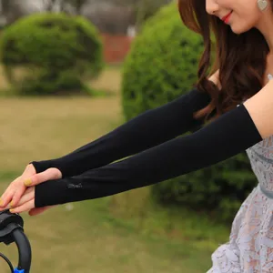 Black ice silk sun protection arm sleeves detail, outdoor UV-blocking sports accessories.