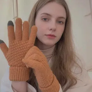 Winter warm knitted gloves with touch screen function and cozy cashmere-like texture design.