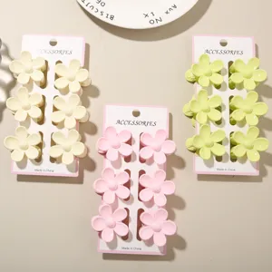 Set of six small 3.5cm flower hair claws in pastel pink cream and lime green colors