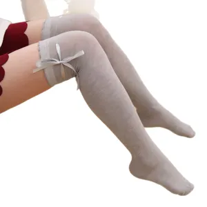 Calze sopra il ginocchio grigie da donna con elegante design a fiocco, vista principale.