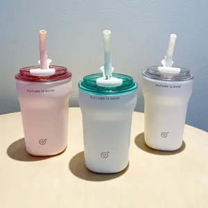 Set of three minimalist matte pastel insulated coffee tumblers with matching silicone straws