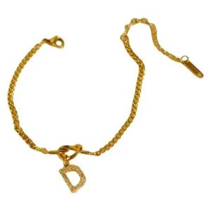 Gold-finish curb chain bracelet featuring a sparkling pavé crystal letter D initial pendant.