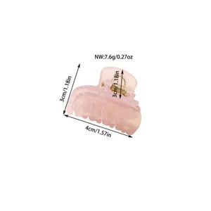 Detail view of a pink jelly hair claw clip with dimensions 4x3cm and weight 7.6g.
