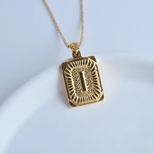 Gold stainless steel initial letter square pendant necklace jewelry detail closeup view