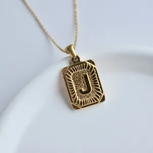 Gold stainless steel letter J pendant necklace with delicate chain for women fashion jewelry.