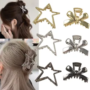 Detailed close-up showing metallic star and bow hair claw clips with model wearing reference