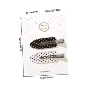 Size details of black and white polka dot acetate duckbill hair clips 2-piece set.