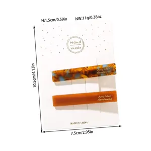 Detail view of two-piece acetate hair clip set with precise size measurements