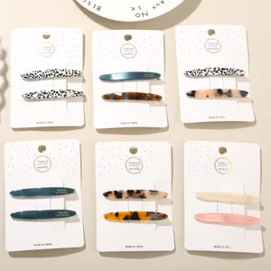 Premium set of six acetate hair barrette pairs featuring leopard and marble patterns