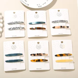 Collection of two-piece acetate duckbill hair clip sets with diverse stylish patterns