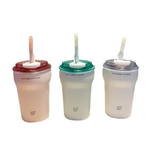 Set of three minimalist insulated stainless steel coffee cups with straws in pastel colors
