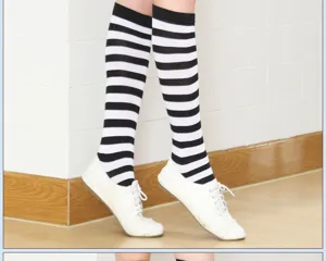 Classic black and white striped knee high socks for women, stylish student hosiery detail.