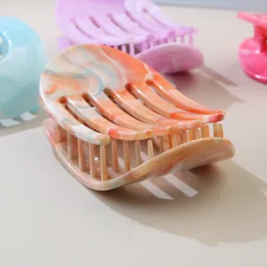 Marble pattern ABS hair claw clip for elegant updo hairstyles in various pastel colors.