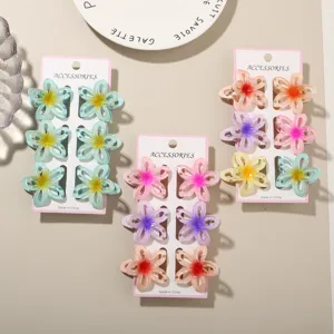Zesdelige set van 4 cm kleurverloop holle frangipani bloem haarklemmen in detail
