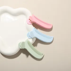 Set of three macaron-colored hair clip combs for fringe styling and hair management