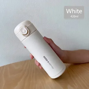Bouteille isotherme portable en acier inoxydable blanc crème avec couvercle à clapet