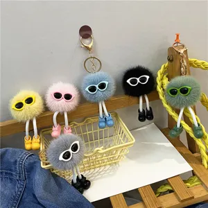 Cute colorful fluffy pom-pom keychain with sunglasses and tiny shoes bag accessory