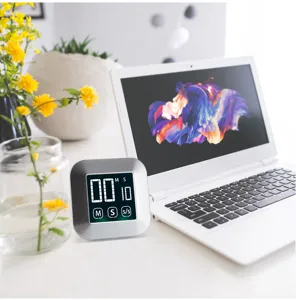Digital kitchen timer with large display and touch buttons, ideal for baking and cooking tasks.