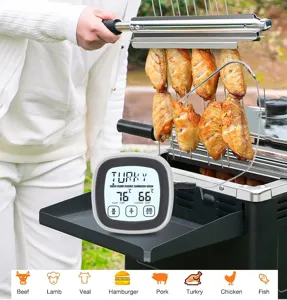 Close-up detail view of the wireless touch screen food thermometer used on a barbecue grill.