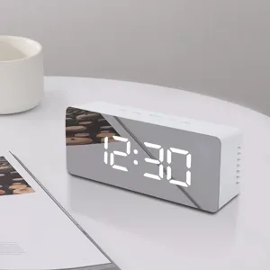 Creative LED mirror digital clock minimalist bedside electronic alarm clock with clear display.