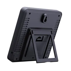 Back view of digital thermometer clock with stand and wall mount hole, black electronic device.