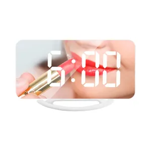 Modern LED digital mirror alarm clock with large display, dual USB ports and stylish table design.
