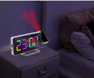 Bedside projection alarm clock detail, colorful digital time on wall and large LED screen.