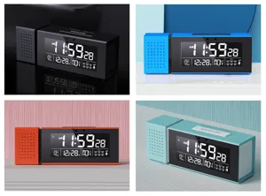Multifunctional digital alarm clock radio with color night light display design features.