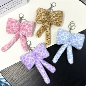 Cute leopard print plush bow keychains for bags in four assorted colors pink blue purple