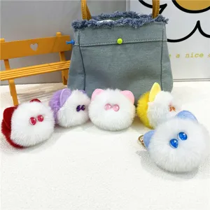 Assorted cute plush cat head keychains in vibrant colors shown as bag charm accessories