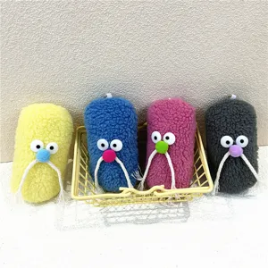Four cute mustache monster plush keychains in yellow, blue, pink, and grey colors.