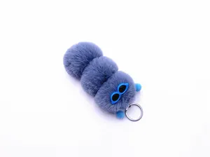 Detailed view of a cute blue caterpillar plush keychain with blue sunglasses charm.