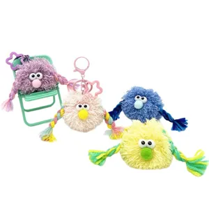 Cute and quirky plush monster keychains featuring colorful braided arms for bag charms