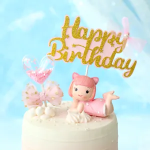 Detail view of pink glitter Happy Birthday cake topper with cute girl figurine